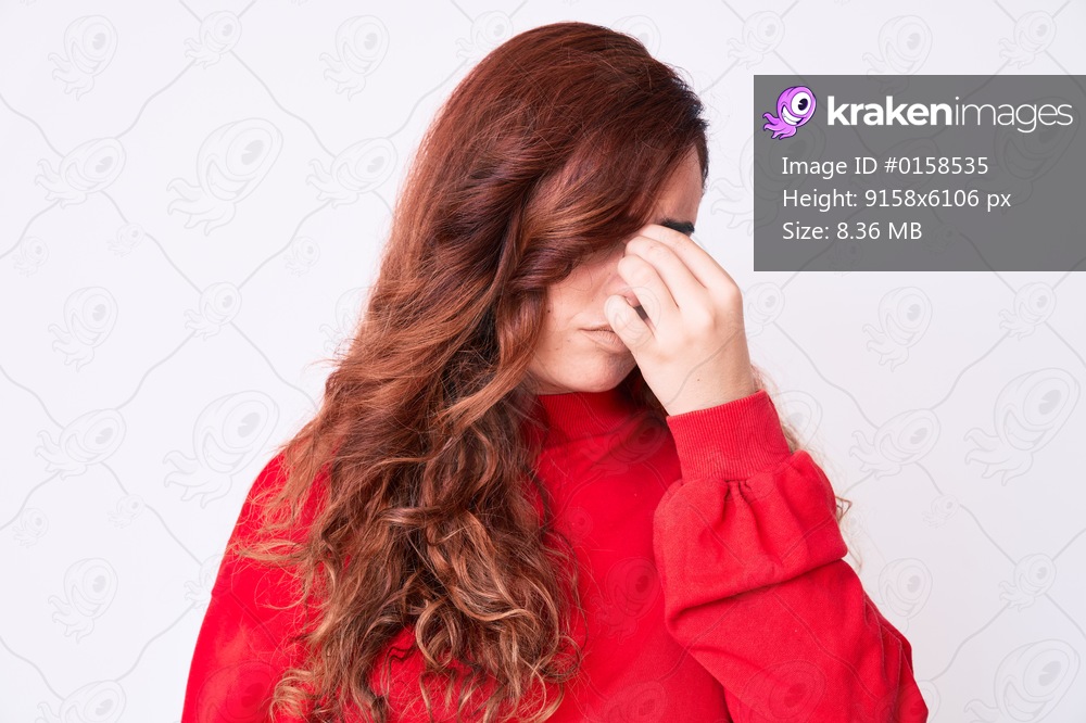 Young beautiful woman wearing casual clothes tired rubbing nose and eyes feeling fatigue and headache. stress and frustration concept. 