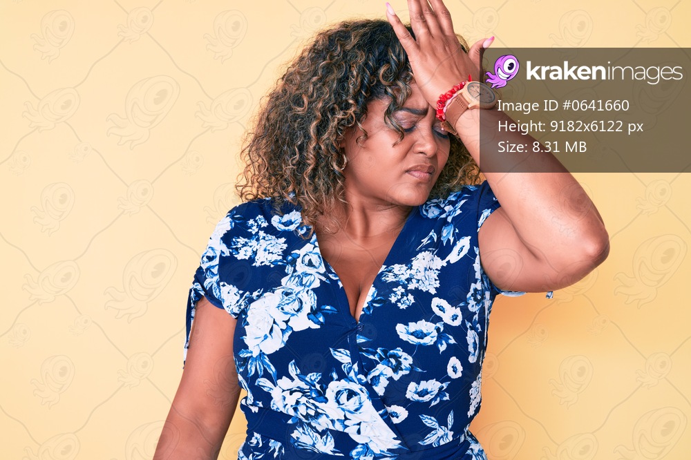 Young african american plus size woman wearing casual clothes surprised with hand on head for mistake, remember error. forgot, bad memory concept. 