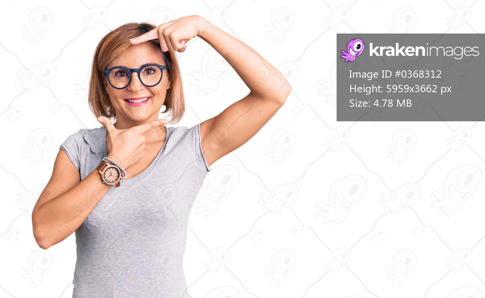 Young blonde woman wearing casual clothes smiling making frame with hands and fingers with happy face. creativity and photography concept. 