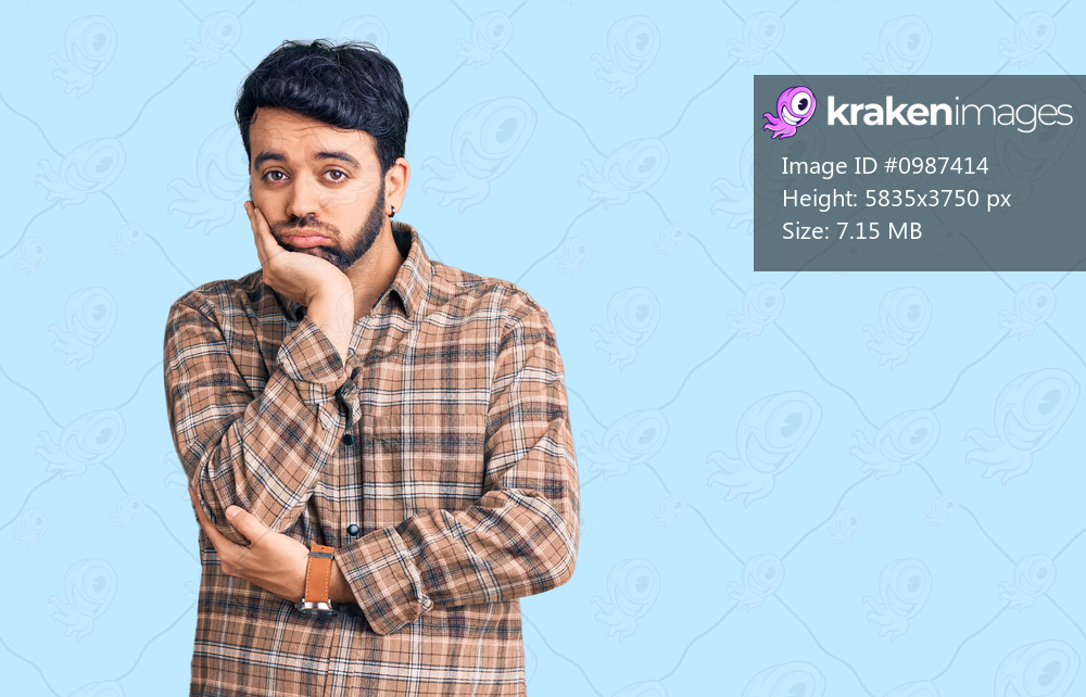 Young hispanic man wearing casual clothes thinking looking tired and bored with depression problems with crossed arms. 