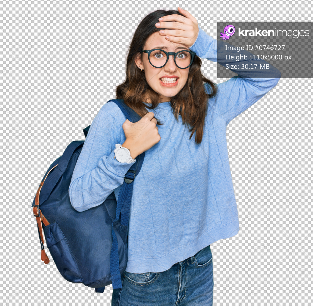 Young beautiful girl wearing student backpack stressed and frustrated with hand on head, surprised and angry face