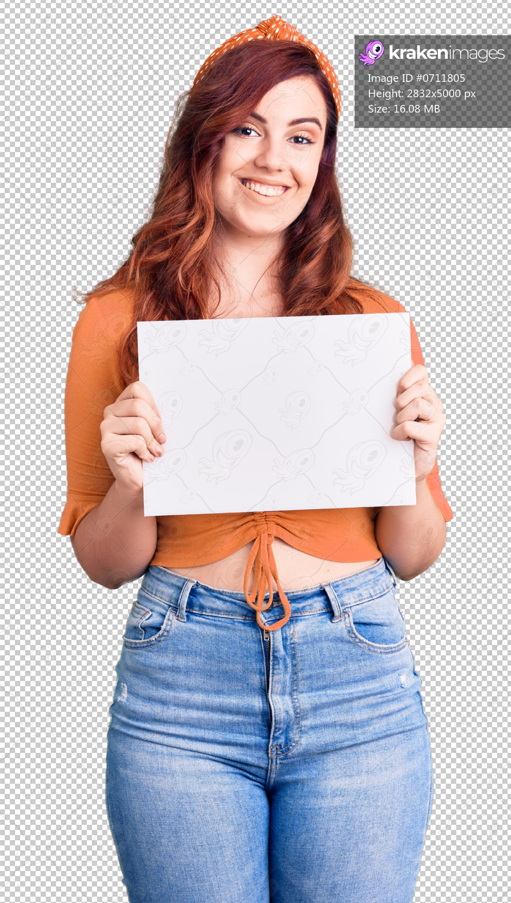Young beautiful woman holding cardboard banner with blank space looking positive and happy standing and smiling with a confident smile showing teeth