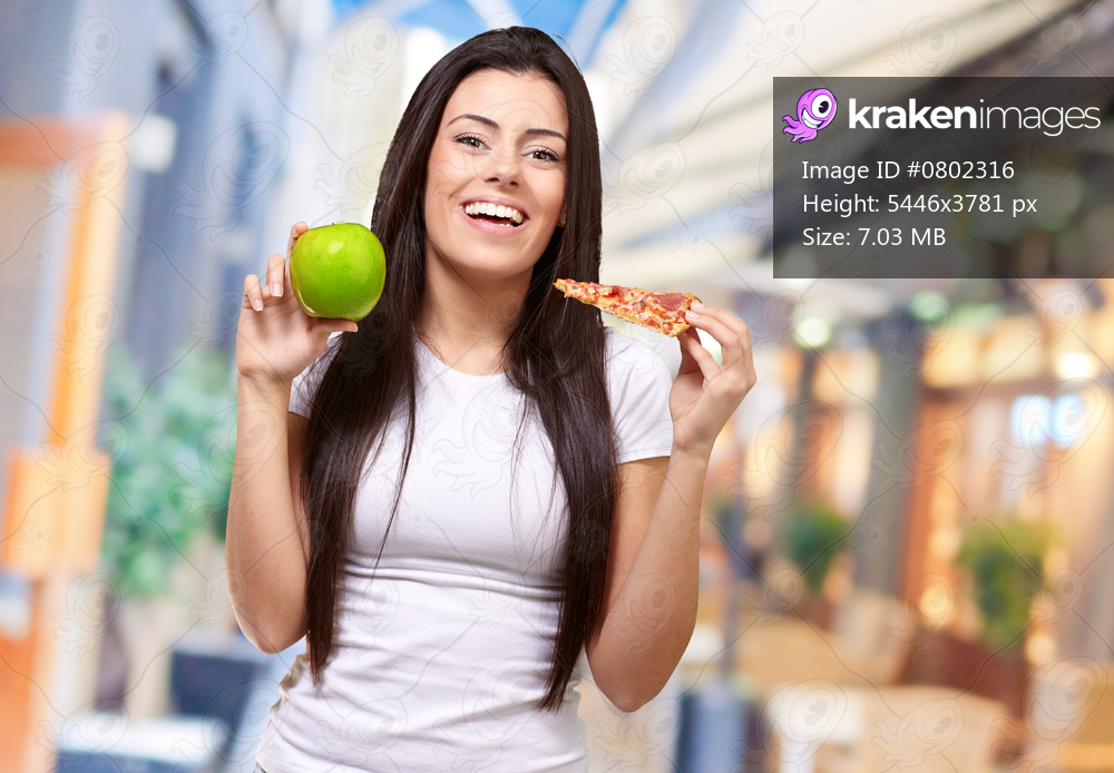 Female Holding A Piece Of Pizza And A Apple, Background