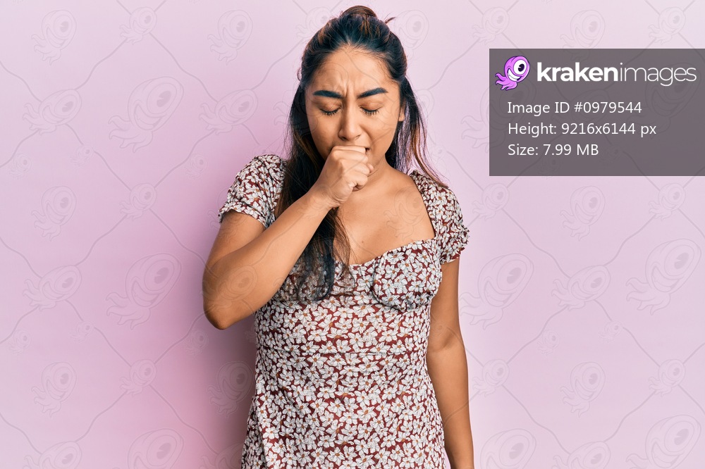 Young latin woman wearing casual clothes feeling unwell and coughing as symptom for cold or bronchitis. health care concept. 