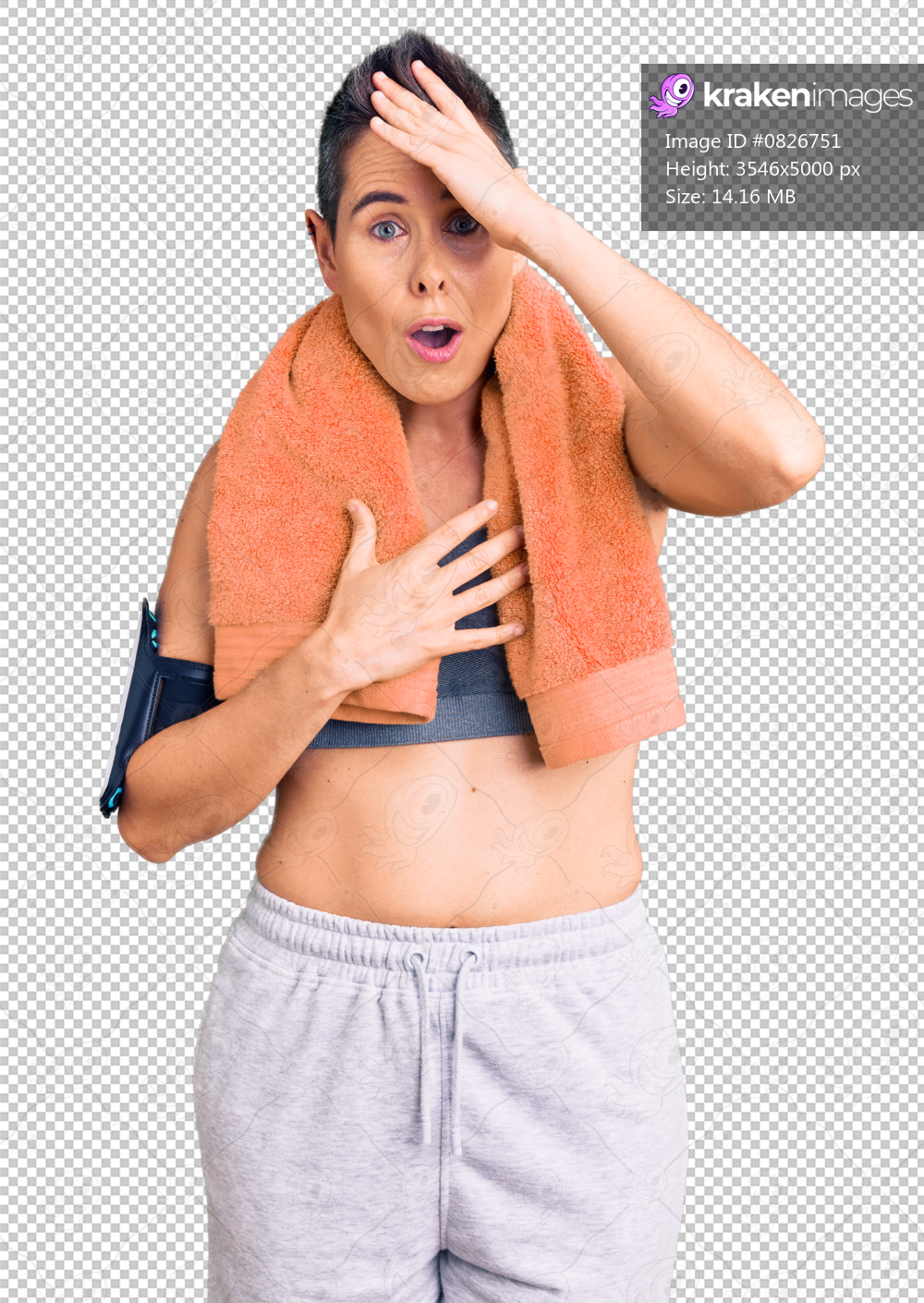 Young woman with short hair wearing sportswear and towel using smartphone surprised with hand on head for mistake, remember error. forgot, bad memory concept.