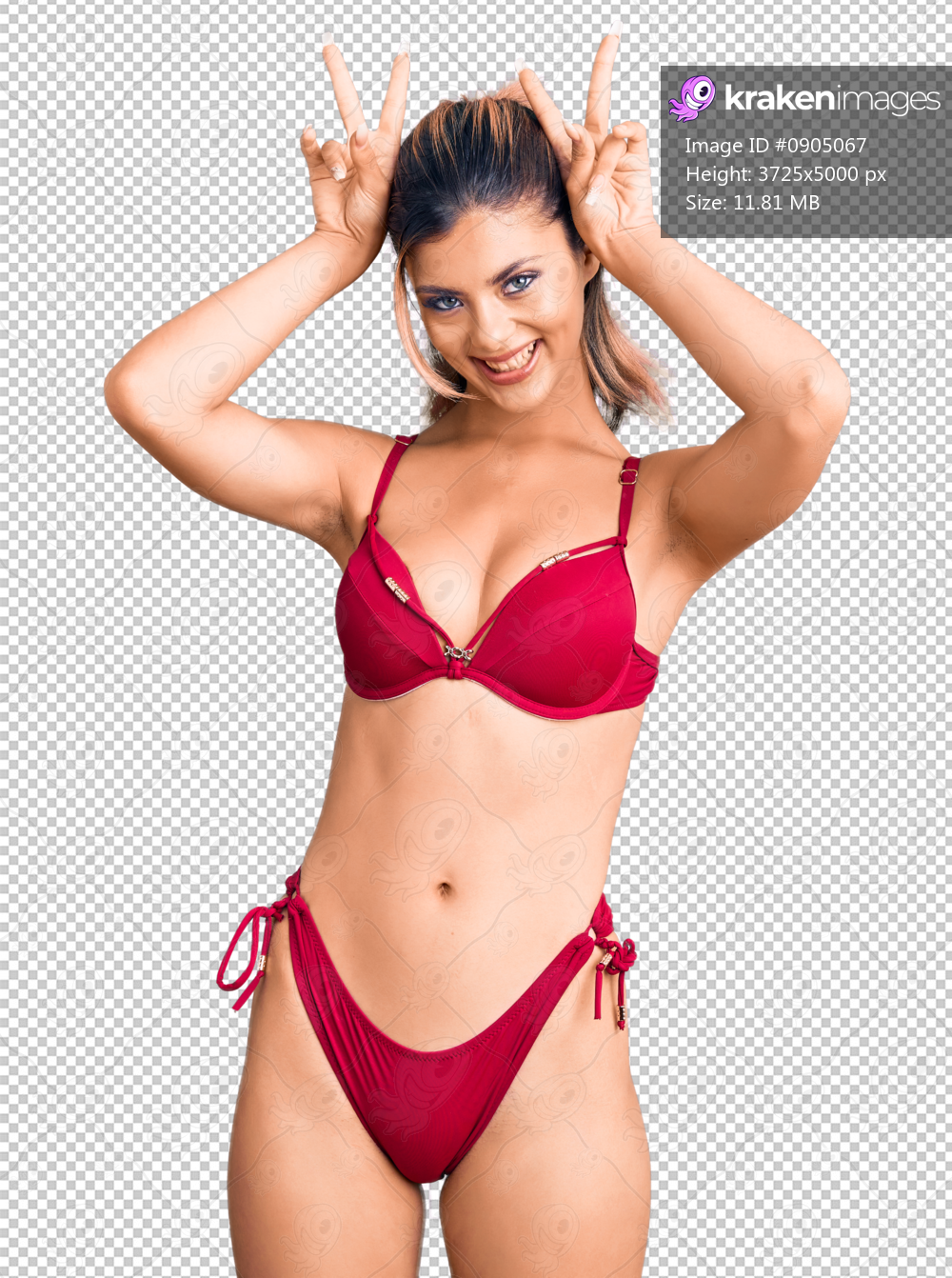 Young beautiful woman wearing bikini posing funny and crazy with fingers on head as bunny ears, smiling cheerful