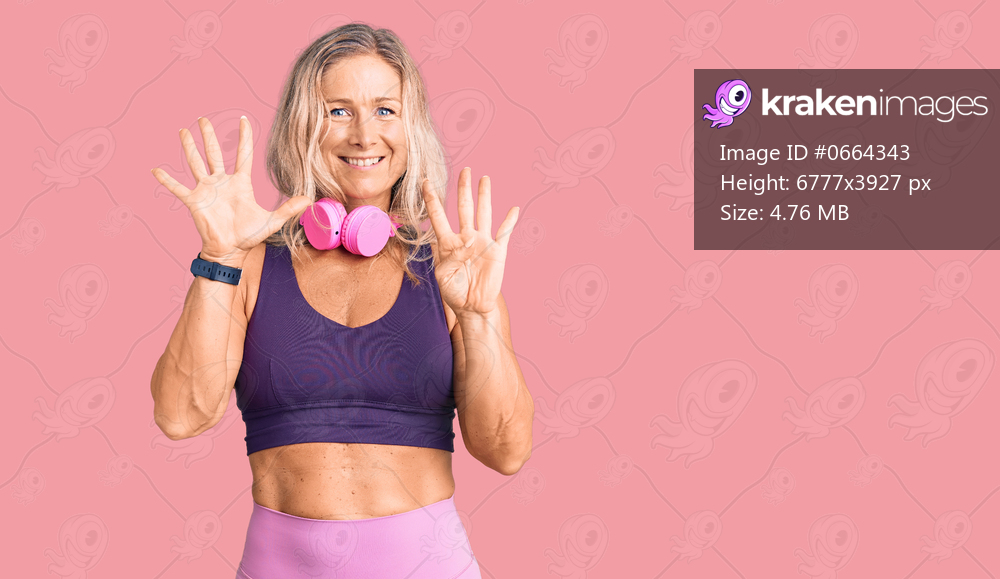 Middle age fit blonde woman wearing gym clothes and using headphones showing and pointing up with fingers number nine while smiling confident and happy. 