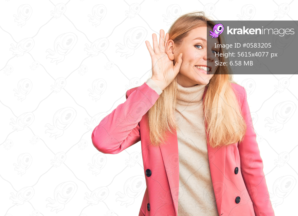 Young beautiful blonde woman wearing elegant clothes smiling with hand over ear listening an hearing to rumor or gossip. deafness concept. 