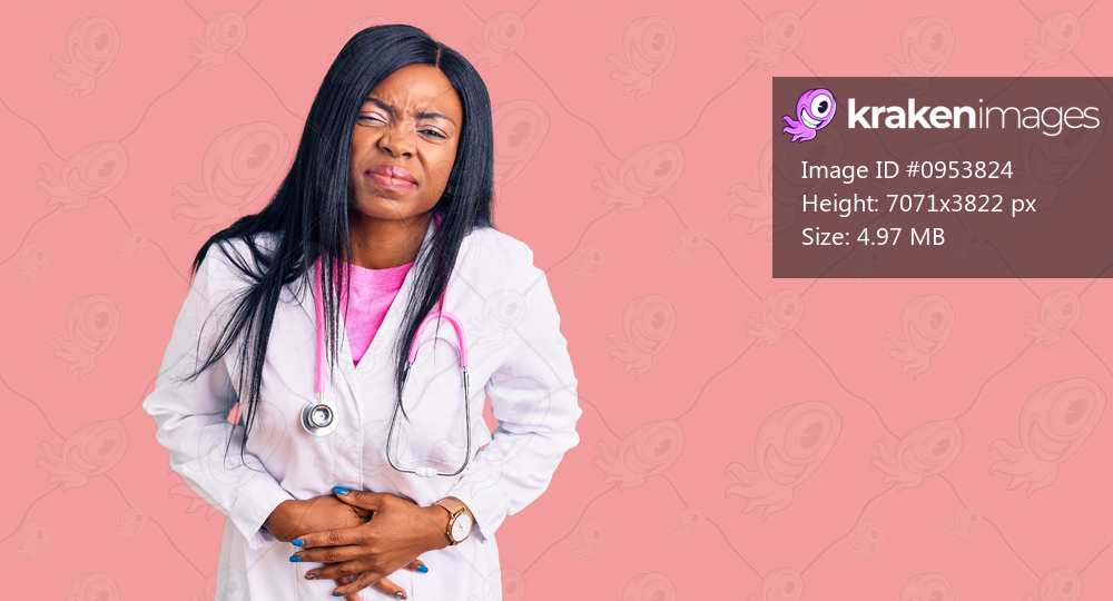 Young african american woman wearing doctor stethoscope with hand on stomach because indigestion, painful illness feeling unwell. ache concept. 
