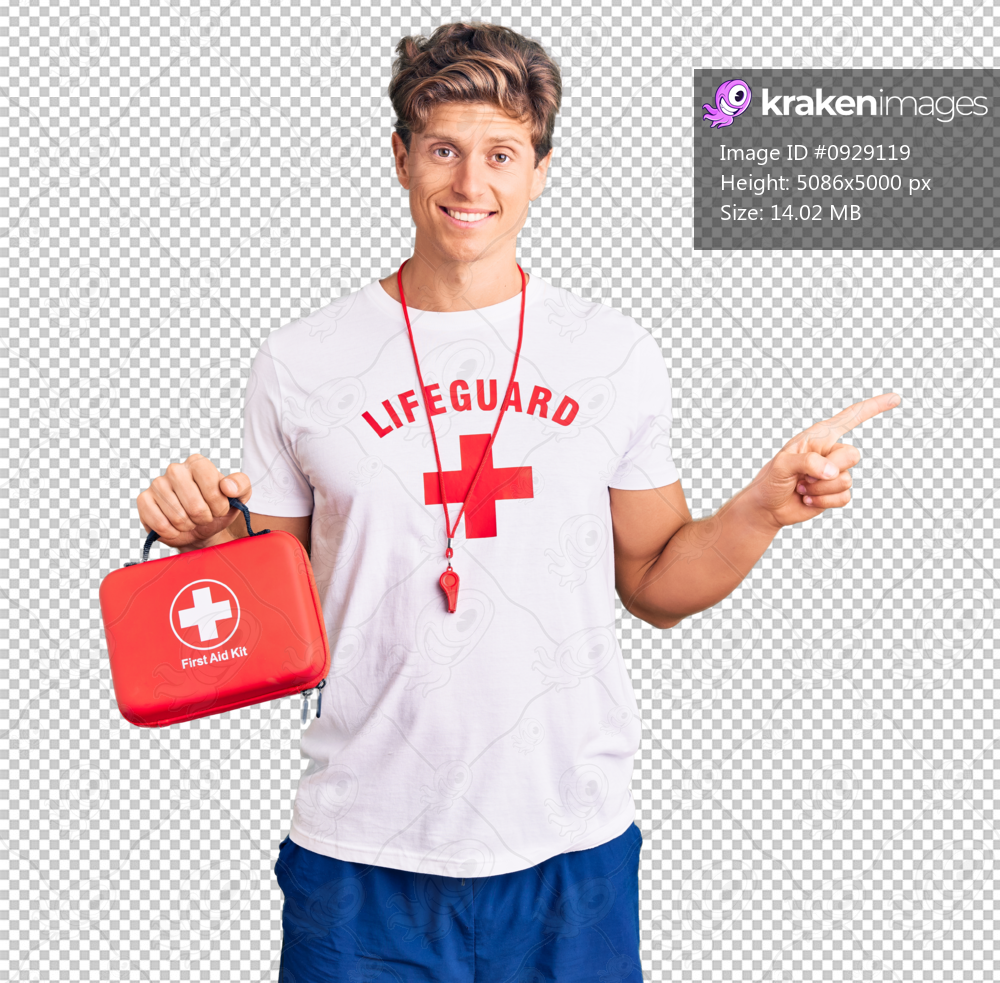 Young handsome man wearing lifeguard t shirt holding first aid kit smiling happy pointing with hand and finger to the side