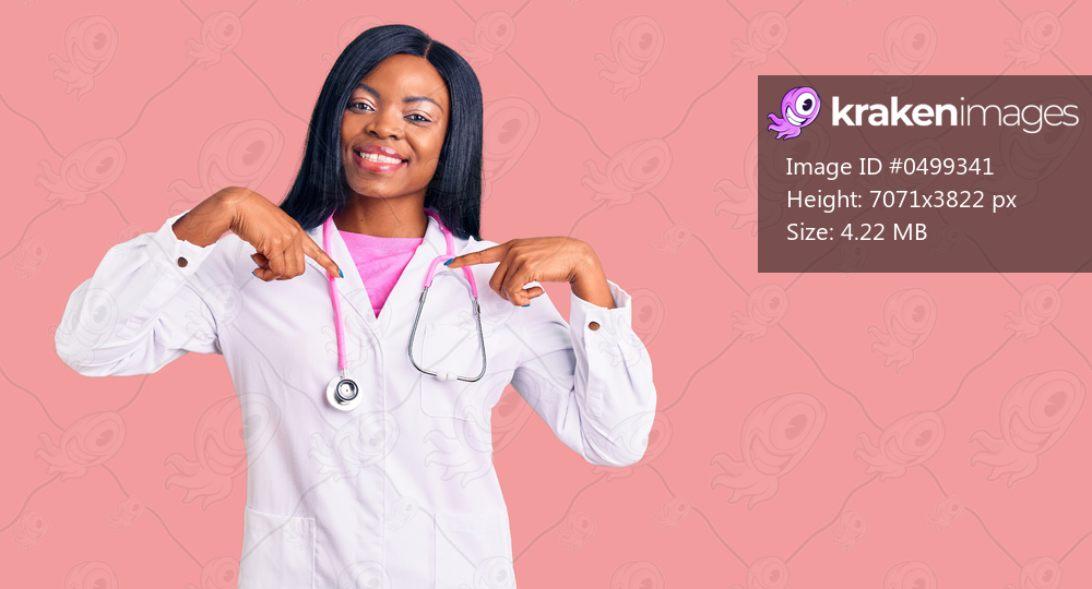 Young african american woman wearing doctor stethoscope looking confident with smile on face, pointing oneself with fingers proud and happy. 