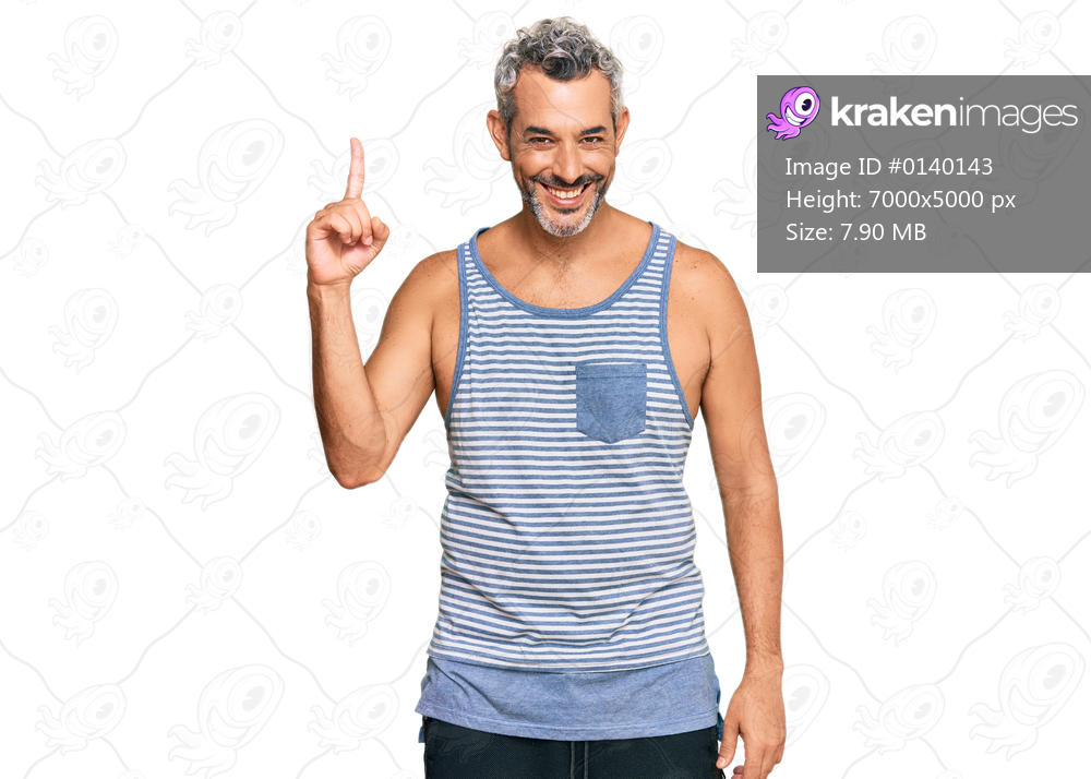 Middle age grey-haired man wearing casual style with sleeveless shirt pointing finger up with successful idea. exited and happy. number one. 