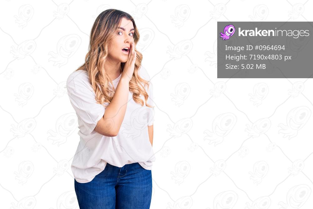 Young caucasian woman wearing casual clothes hand on mouth telling secret rumor, whispering malicious talk conversation 