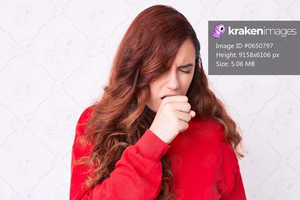 Young beautiful woman wearing casual clothes feeling unwell and coughing as symptom for cold or bronchitis. health care concept. 