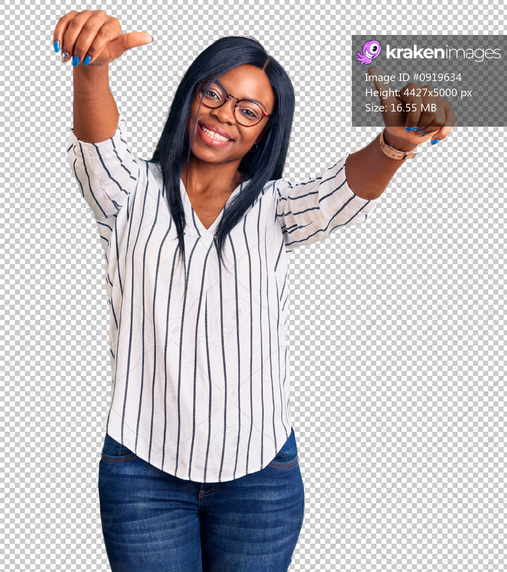 Young african american woman wearing casual clothes and glasses approving doing positive gesture with hand, thumbs up smiling and happy for success. winner gesture.