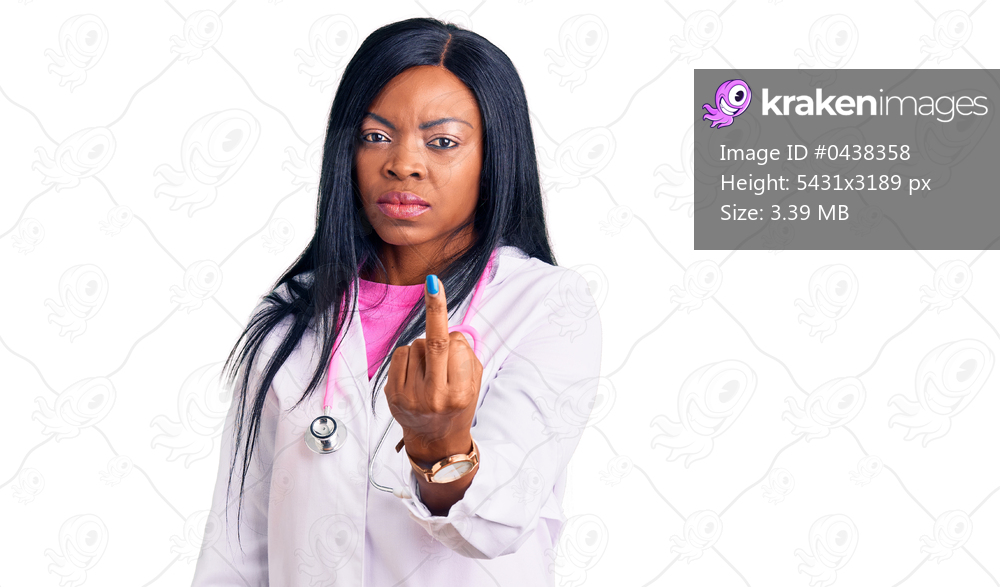 Young african american woman wearing doctor stethoscope showing middle finger, impolite and rude fuck off expression 