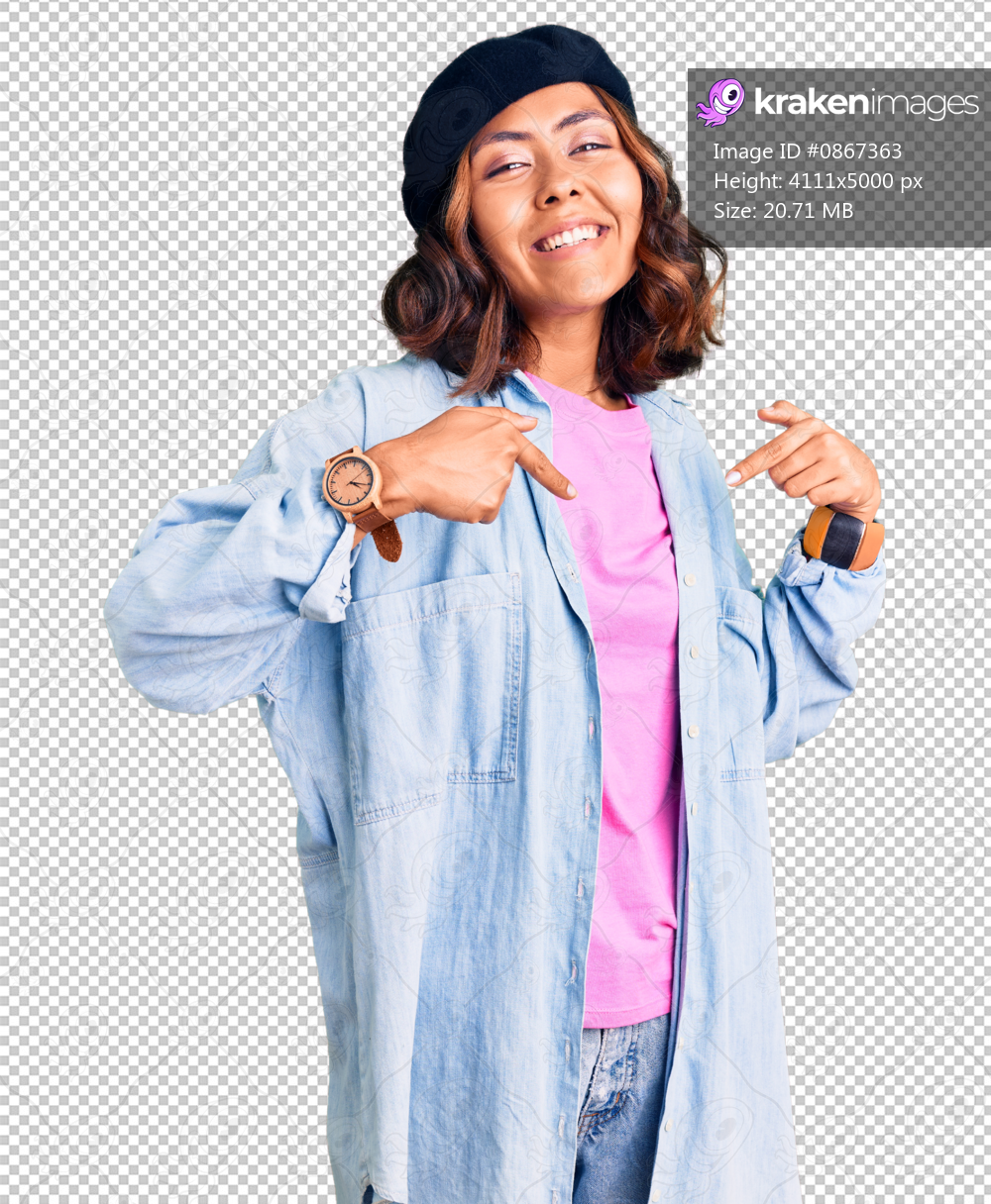 Young beautiful mixed race woman wearing french look with beret looking confident with smile on face, pointing oneself with fingers proud and happy.