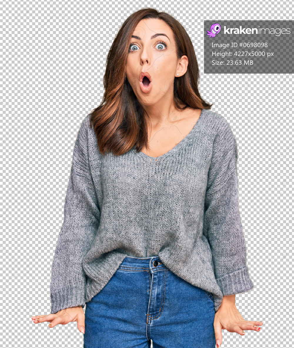 Young brunette woman wearing casual winter sweater scared and amazed with open mouth for surprise, disbelief face