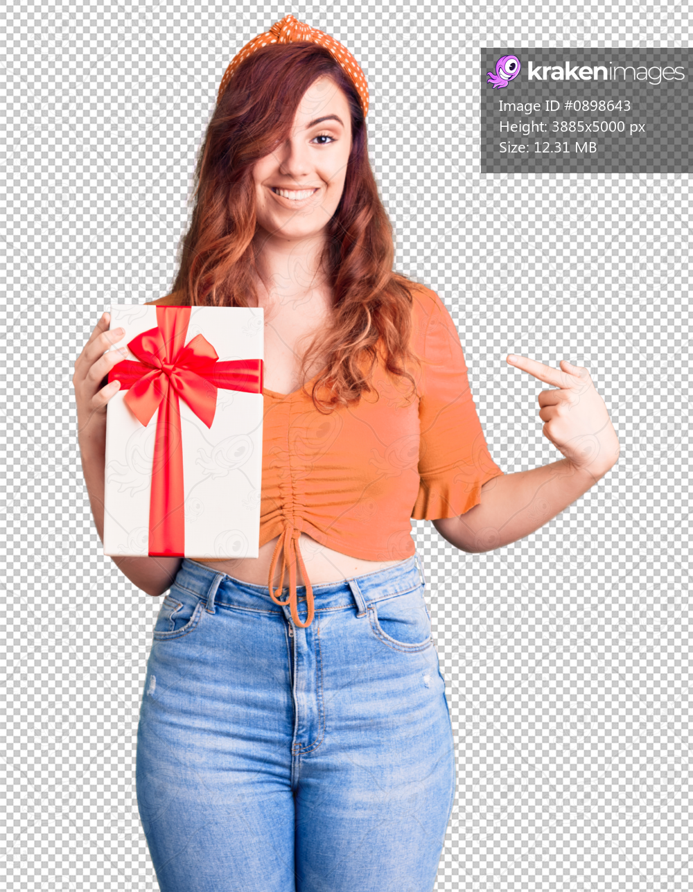 Young beautiful woman holding gift pointing finger to one self smiling happy and proud