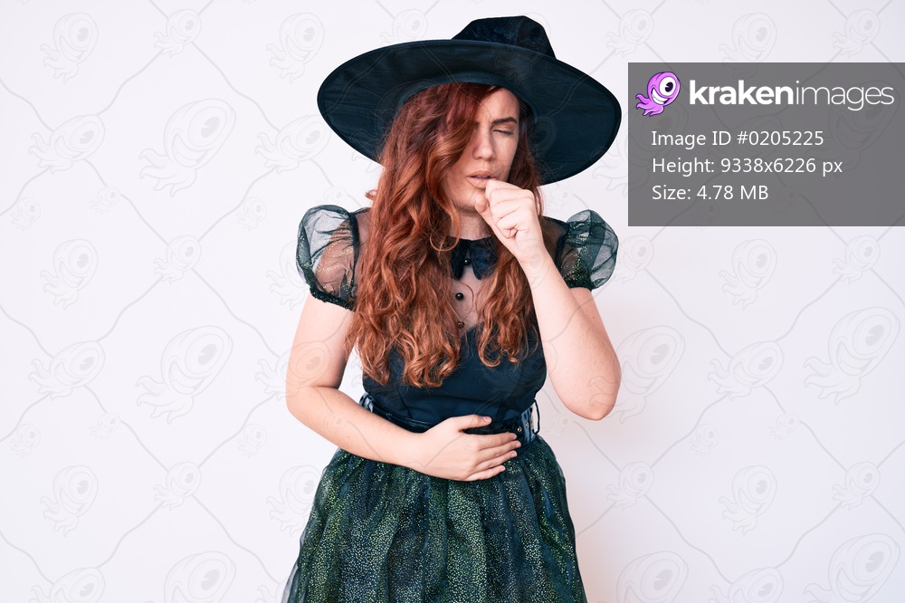 Young beautiful woman wearing witch halloween costume feeling unwell and coughing as symptom for cold or bronchitis. health care concept. 