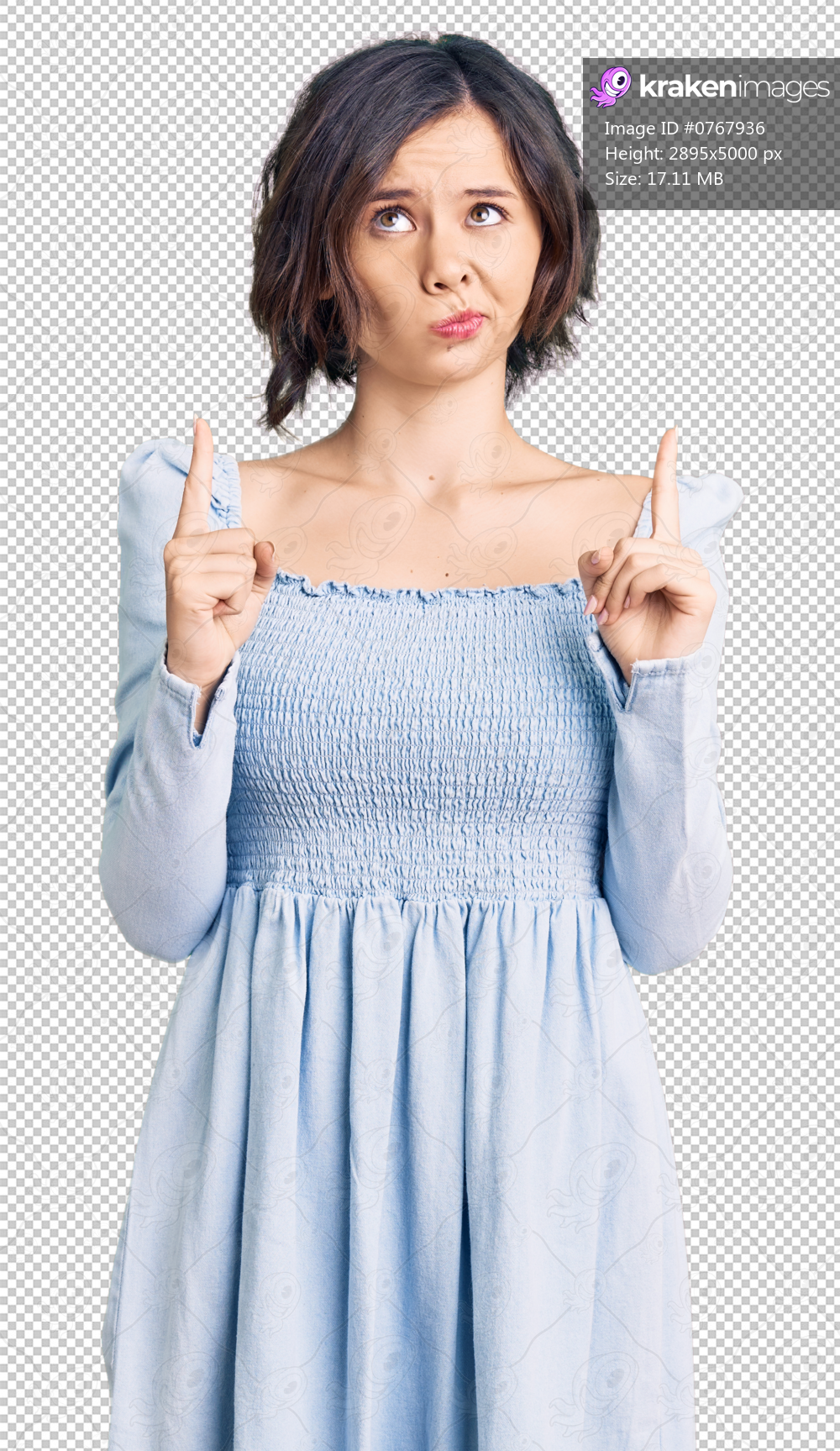 Young beautiful girl wearing casual clothes pointing up looking sad and upset, indicating direction with fingers, unhappy and depressed.