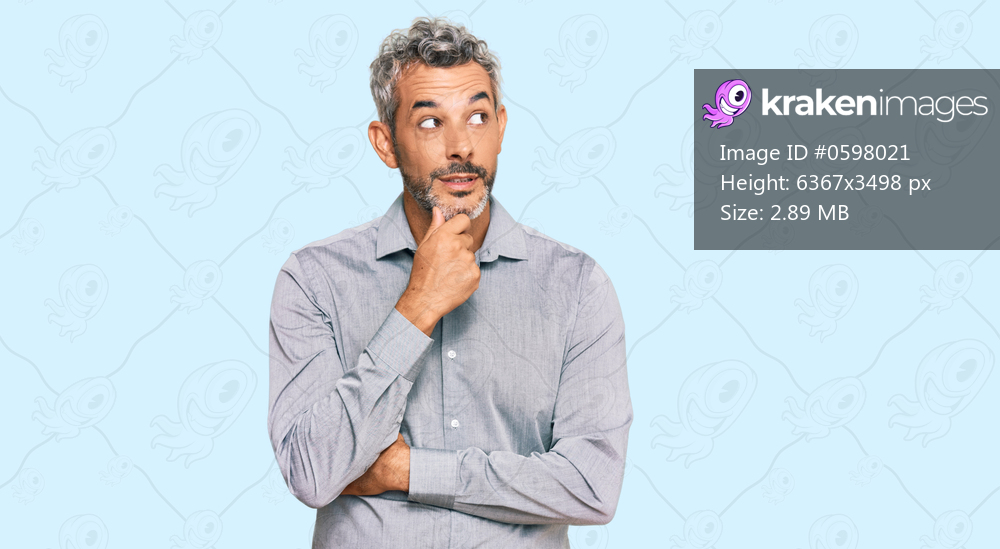 Middle age grey-haired man wearing casual clothes with hand on chin thinking about question, pensive expression. smiling with thoughtful face. doubt concept. 