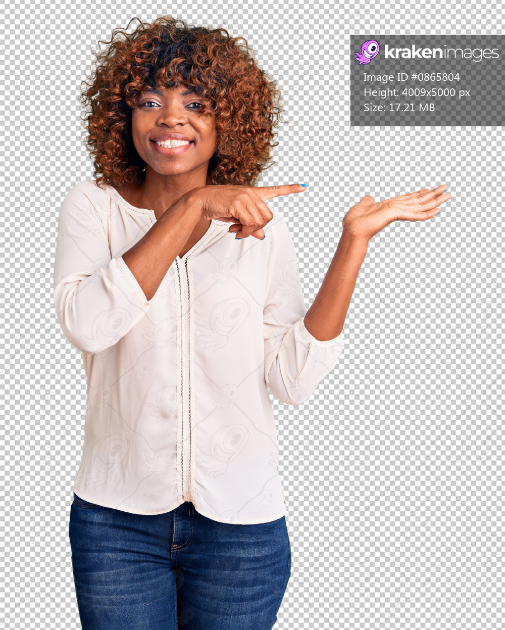 Young african american woman wearing casual clothes amazed and smiling to the camera while presenting with hand and pointing with finger.