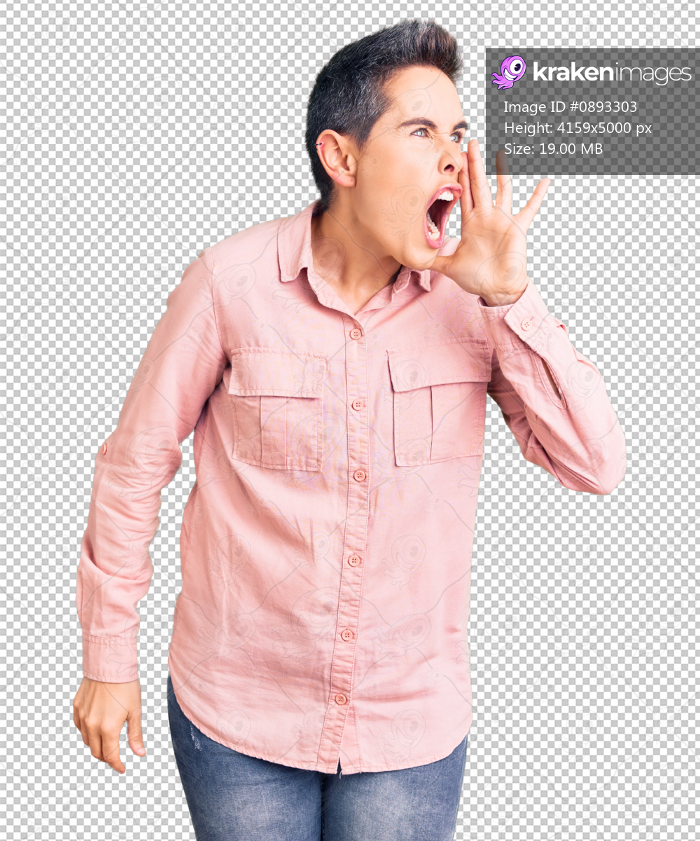 Young woman with short hair wearing casual clothes shouting and screaming loud to side with hand on mouth. communication concept.