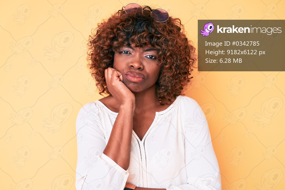 Young african american woman wearing casual clothes thinking looking tired and bored with depression problems with crossed arms. 