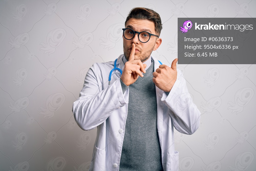 Young doctor man with blue eyes wearing medical coat and stethoscope over isolated background asking to be quiet with finger on lips pointing with hand to the side. Silence and secret concept.