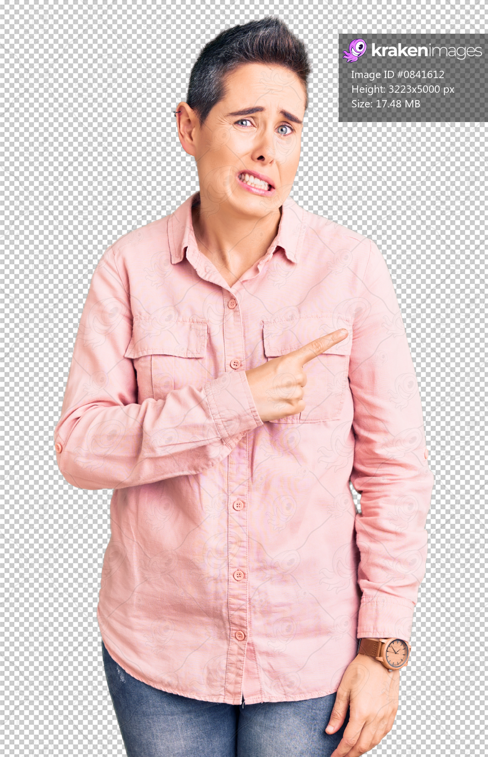 Young woman with short hair wearing casual clothes pointing aside worried and nervous with forefinger, concerned and surprised expression