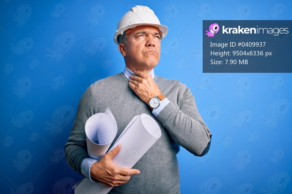 Middle age handsome grey-haired architect man wearing safety helmet holding blueprints Touching painful neck, sore throat for flu, clod and infection