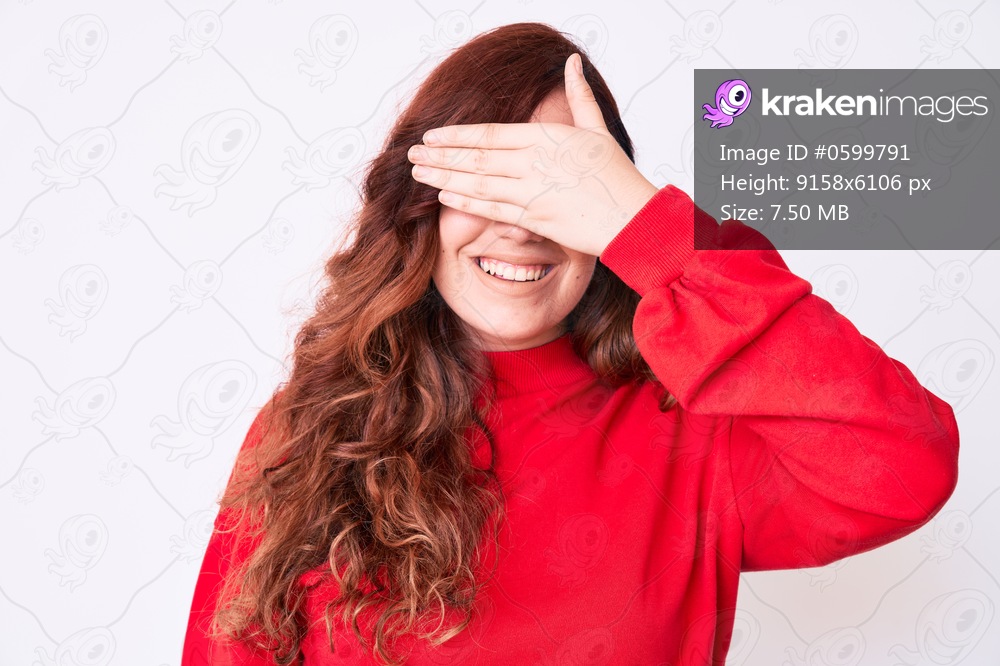 Young beautiful woman wearing casual clothes smiling and laughing with hand on face covering eyes for surprise. blind concept. 