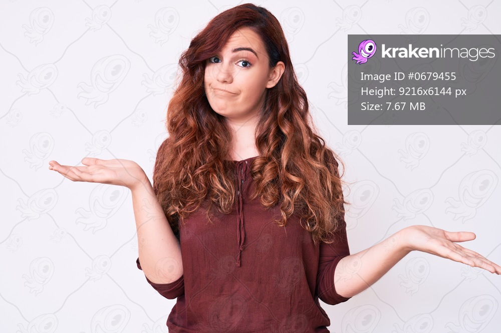 Young beautiful woman wearing casual clothes clueless and confused expression with arms and hands raised. doubt concept. 