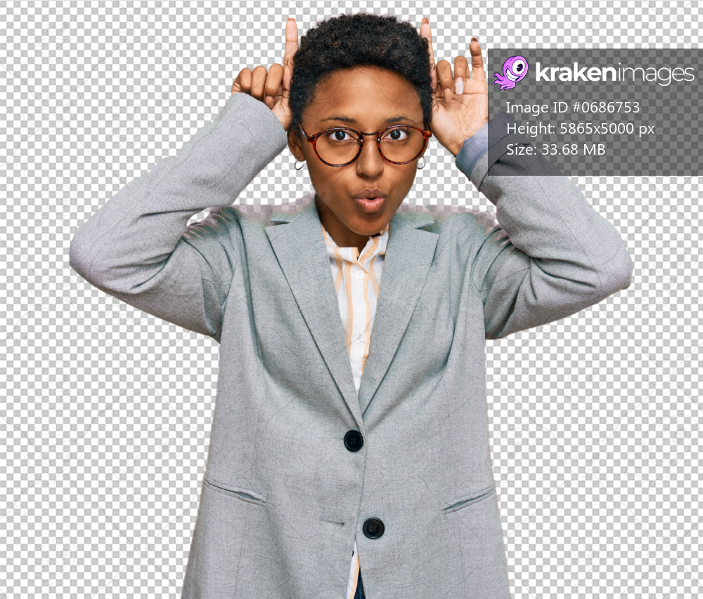 Young african american woman wearing business clothes doing funny gesture with finger over head as bull horns