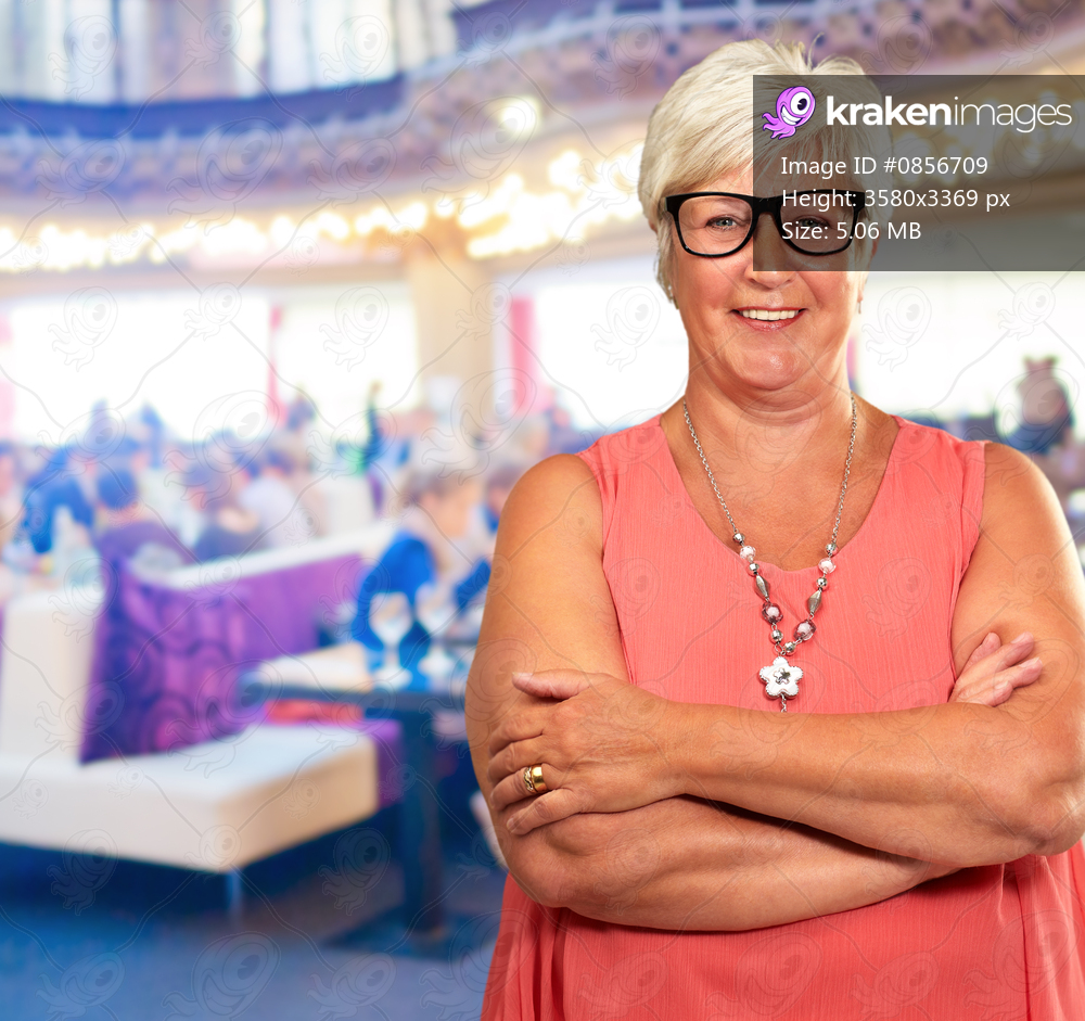 Portrait Of A Mature Woman In Restaurant