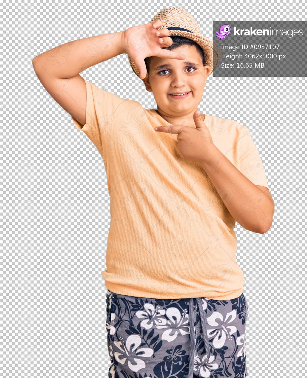 Little boy kid wearing summer hat and hawaiian swimsuit smiling making frame with hands and fingers with happy face. creativity and photography concept.