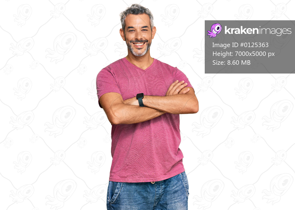 Middle age grey-haired man wearing casual clothes happy face smiling with crossed arms looking at the camera. positive person. 