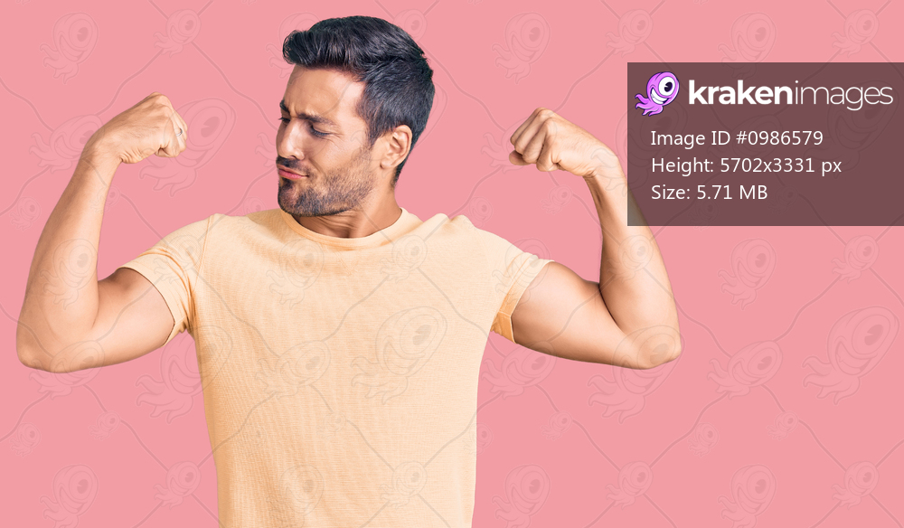 Young hispanic man wearing casual clothes showing arms muscles smiling proud. fitness concept. 