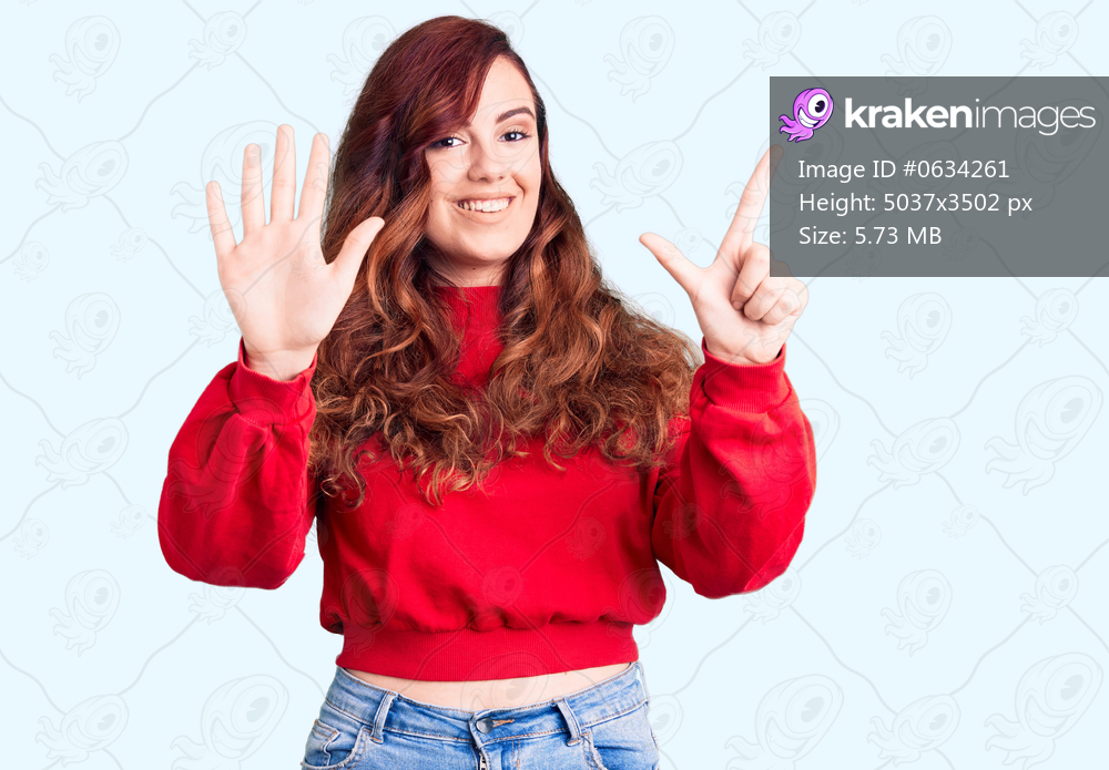 Young beautiful woman wearing casual winter sweater showing and pointing up with fingers number seven while smiling confident and happy. 