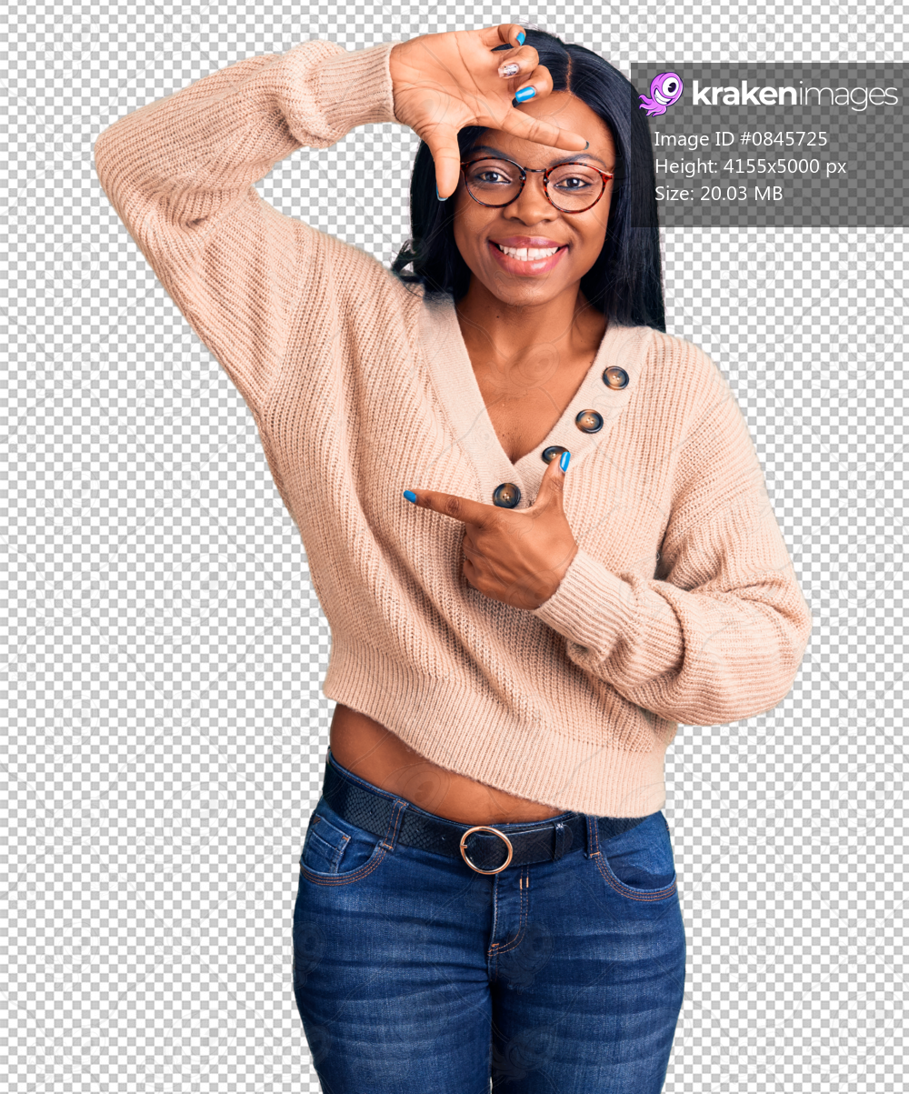 Young african american woman wearing casual clothes smiling making frame with hands and fingers with happy face. creativity and photography concept.