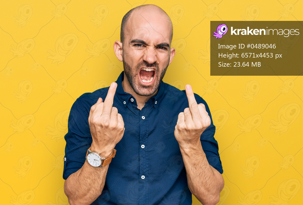 Young hispanic man wearing casual clothes showing middle finger doing fuck you bad expression, provocation and rude attitude. screaming excited 