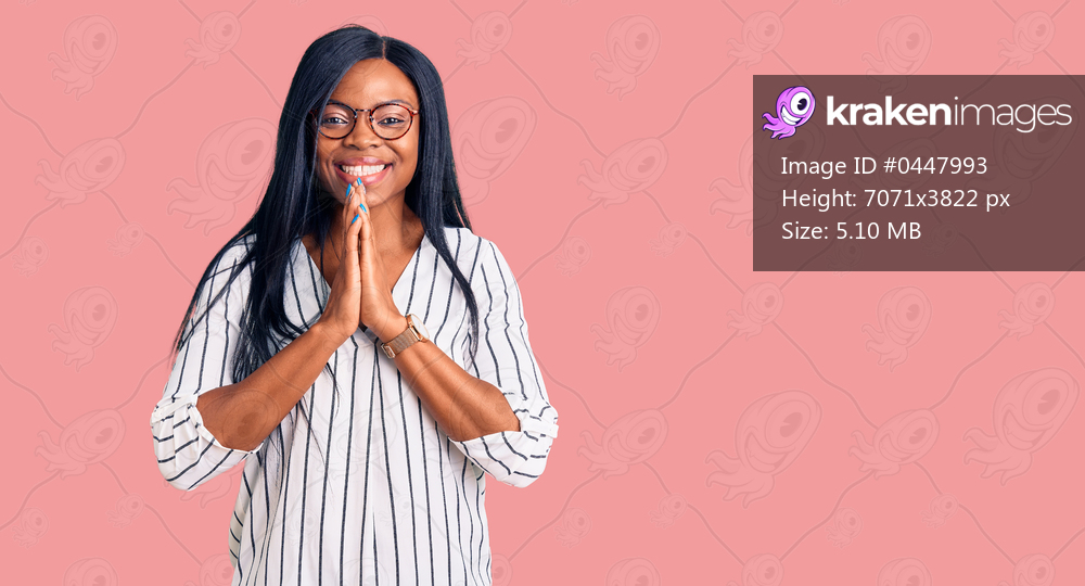 Young african american woman wearing casual clothes and glasses praying with hands together asking for forgiveness smiling confident. 