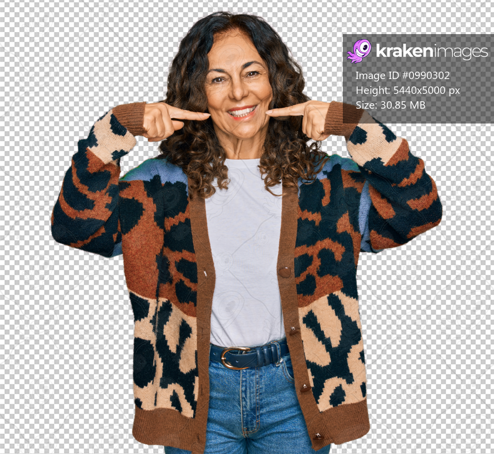 Middle age hispanic woman wearing casual clothes smiling cheerful showing and pointing with fingers teeth and mouth. dental health concept.
