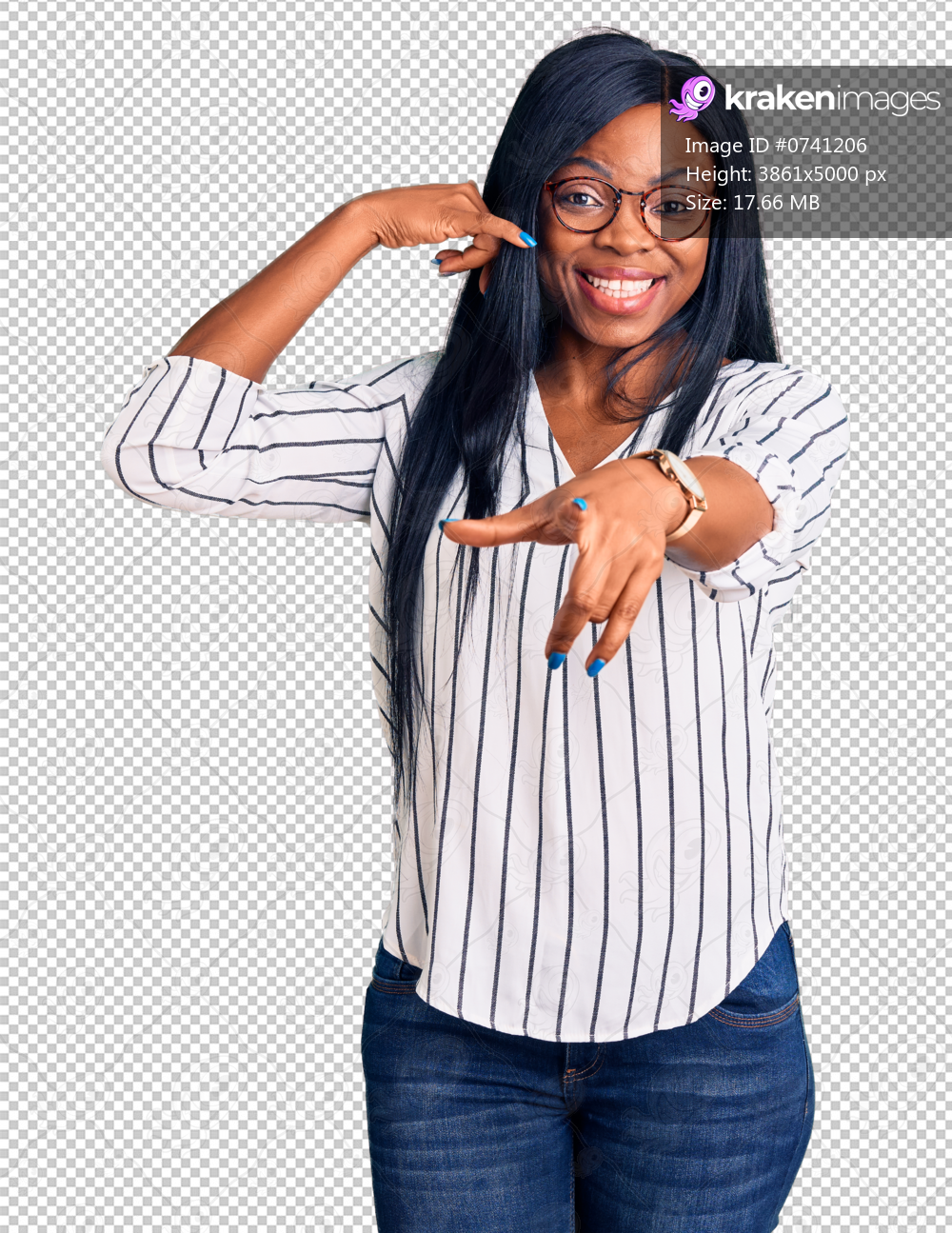 Young african american woman wearing casual clothes and glasses smiling doing talking on the telephone gesture and pointing to you. call me.