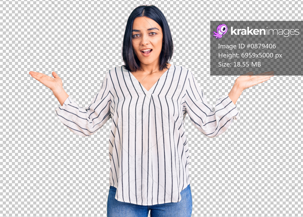 Young beautiful latin woman wearing casual clothes celebrating victory with happy smile and winner expression with raised hands