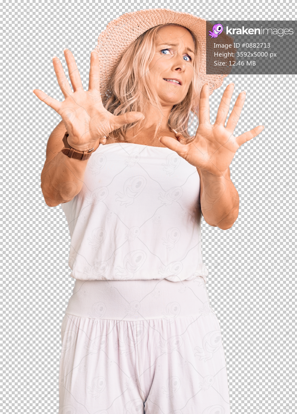 Middle age fit blonde woman wearing summer hat afraid and terrified with fear expression stop gesture with hands, shouting in shock. panic concept.