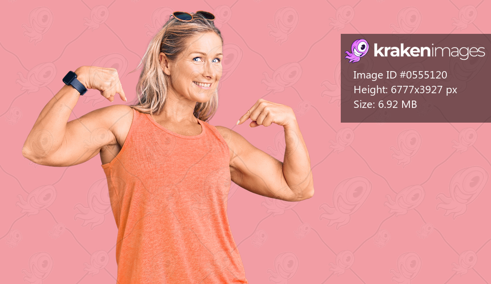 Middle age fit blonde woman wearing casual summer clothes and sunglasses looking confident with smile on face, pointing oneself with fingers proud and happy. 