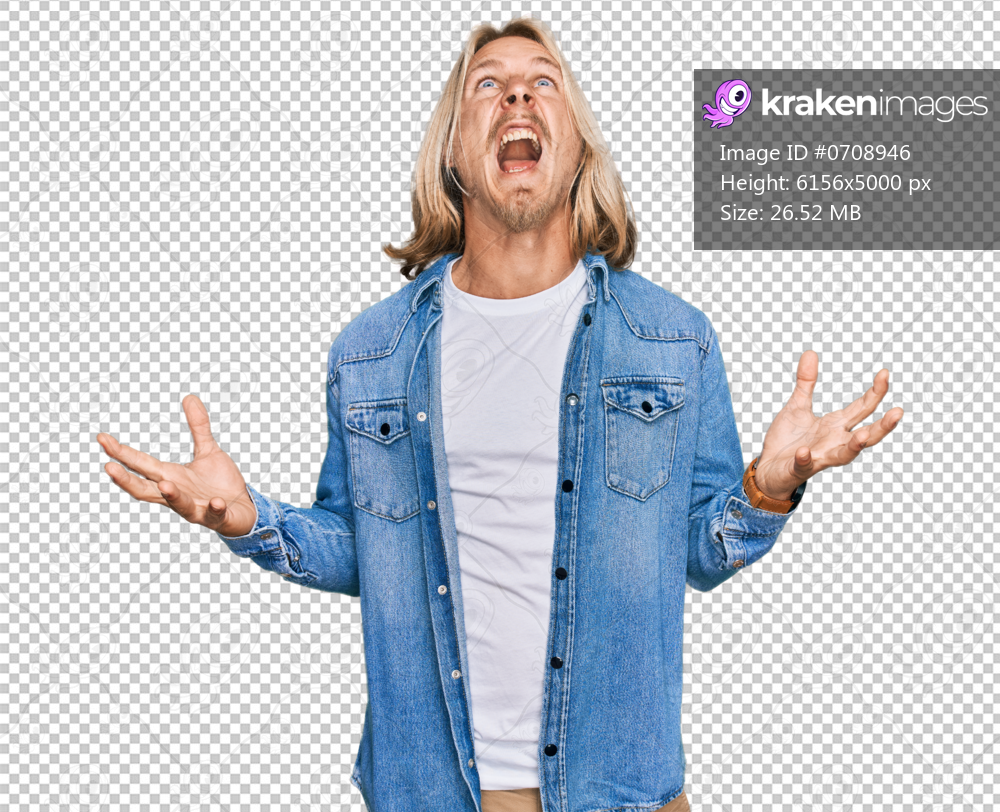 Caucasian man with blond long hair wearing casual denim jacket crazy and mad shouting and yelling with aggressive expression and arms raised. frustration concept.