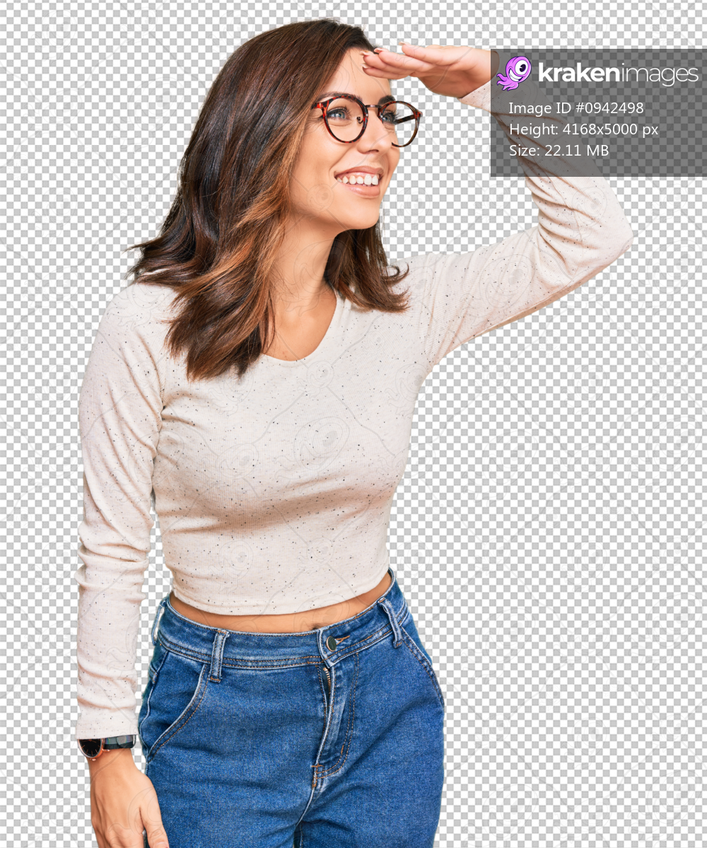 Young brunette woman wearing casual clothes and glasses very happy and smiling looking far away with hand over head. searching concept.